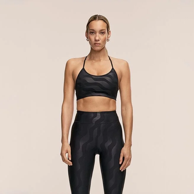 Элегантный спортивный бюстгальтер черного цвета с рисунком